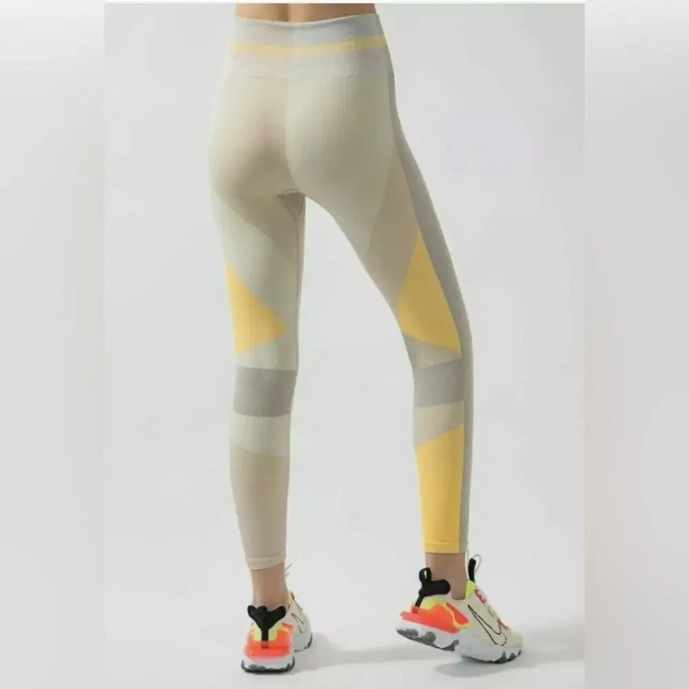 NIKE Sculpt LUX ICON CLASH Seamless 7/8 Training Knit Leggings yellow colorblock